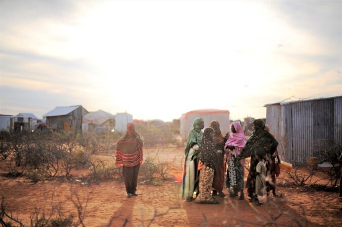 A group of women talk on the outskirts of a camp for Internally Displaced People (IDP's) in Galkayo, Somalia (October 2009). Photo credit: ROBERTO SCHMIDT/AFP/Getty Images