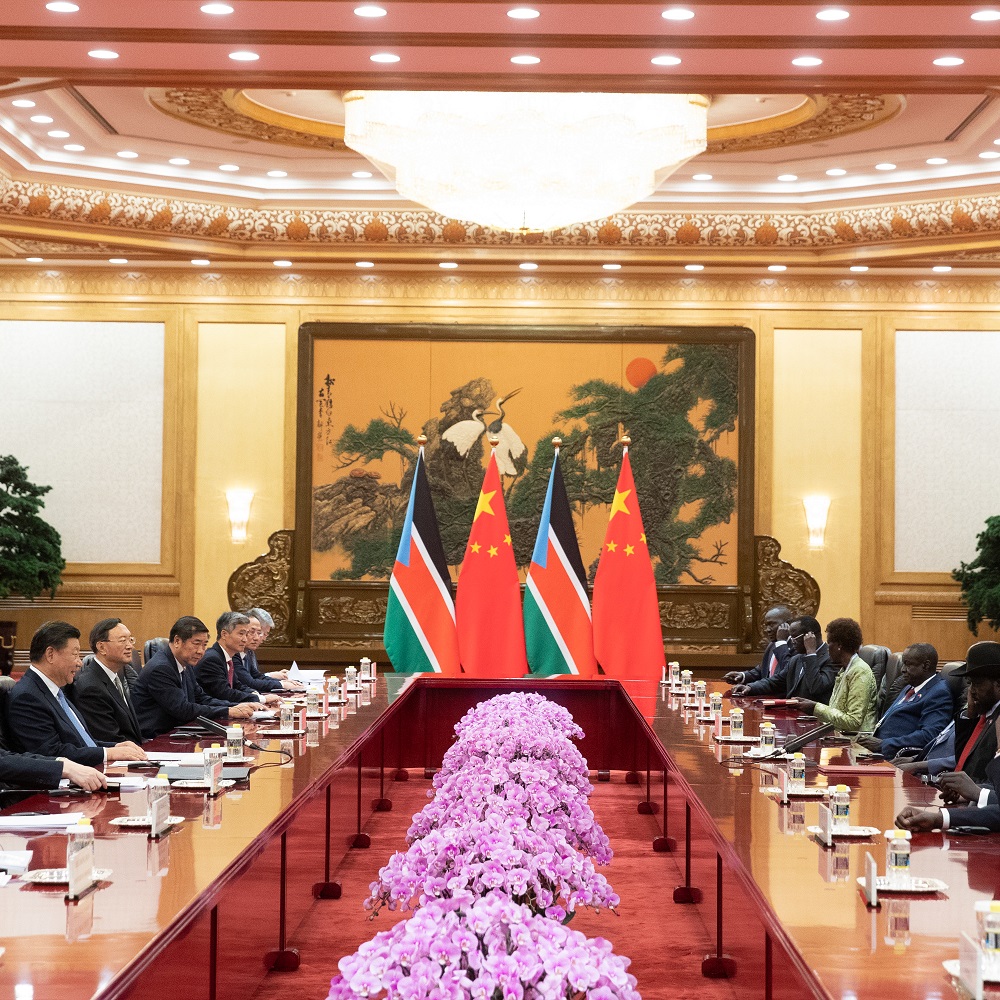 China's President Xi Jinping and President of South Sudan Salva Kiir speak during their bilateral meeting at the Great Hall of the People in Beijing (China, August 2018). Photo: ROMAN PILIPEY/ AFP via Getty Images