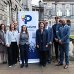 Minister West and members of FCDO and the PeaceRep team pose for photo at Edinburgh Law School