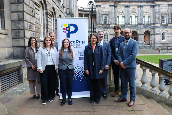 Minister West and members of FCDO and the PeaceRep team pose for photo at Edinburgh Law School