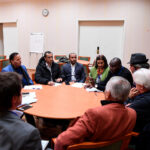 Members of a Yemeni government's delegation take part in a work group with rebel delegation members and UN special envoy to Yemen