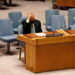 Permanent Representative of Afghanistan to the United Nations holds head in hands