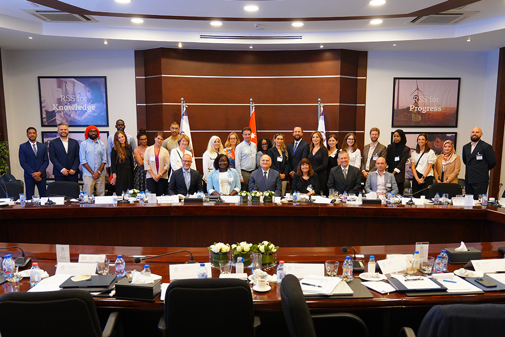 Workshop participants pose for a photo