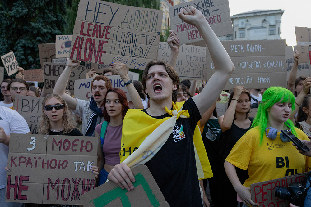 Protesters shout slogans and hold placards during a demonstration against a law that removes the independence of the NABU and SAPO anti-corruption agencies in Kyiv, Ukraine, on July 24.