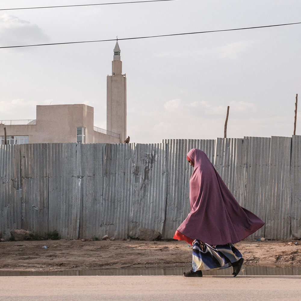A woman walks in a street of the city of Hargeisa, Somaliland