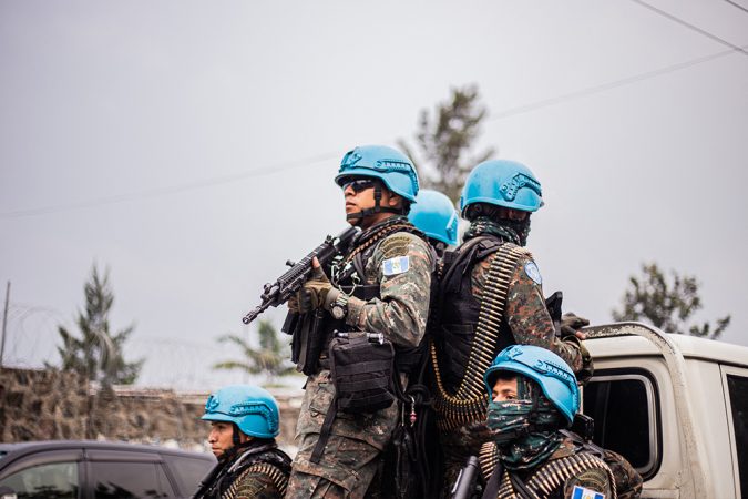 Soldiers of the United Nations Organization Stabilization Mission carry guns in the Democratic Republic of the Congo