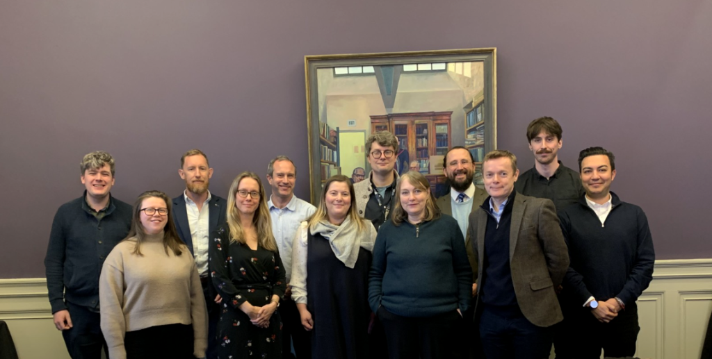 Members of the PeaceRep team and FCDO pose for a group photo